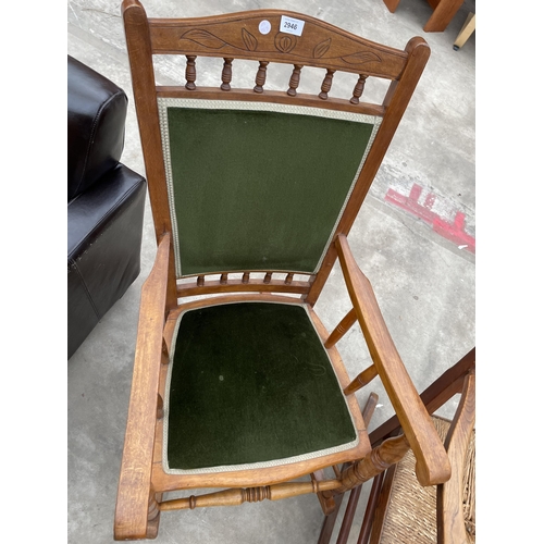 2946 - A LATE VICTORIAN ELM AND BEECH ROCKING CHAIR WITH UPHOLSTERED SEAT AND BACK