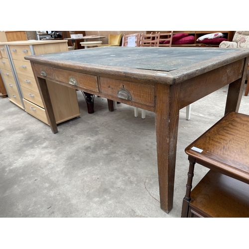 2953 - A MID 20TH CENTURY OAK OFFICE TABLE WITH THREE DRAWERS HAVING BRASS SCOOP HANDLES, 60