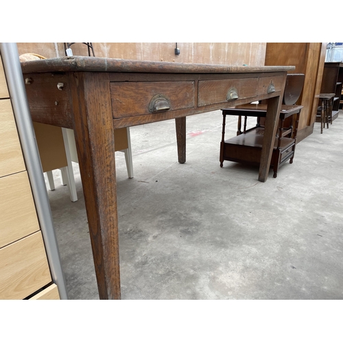 2953 - A MID 20TH CENTURY OAK OFFICE TABLE WITH THREE DRAWERS HAVING BRASS SCOOP HANDLES, 60