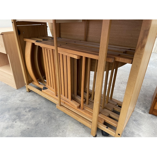 2957 - A GATE-LEG KITCHEN TABLE ENCLOSING FOUR FOLDING CHAIRS AND BEDSIDE LOCKER