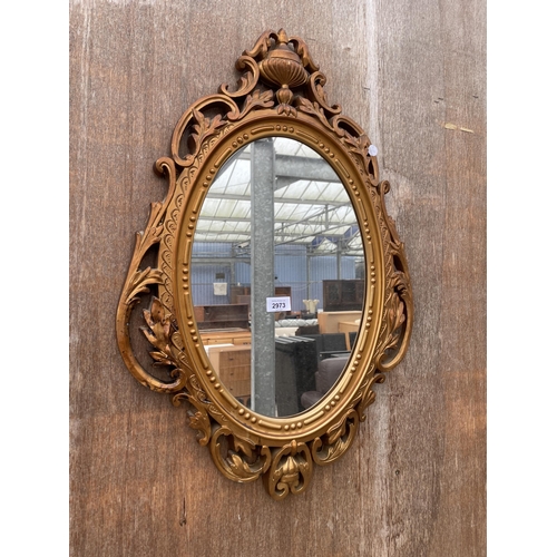 2973 - A 19TH CENTURY STYLE GILT EFFECT WALL MIRROR, 28