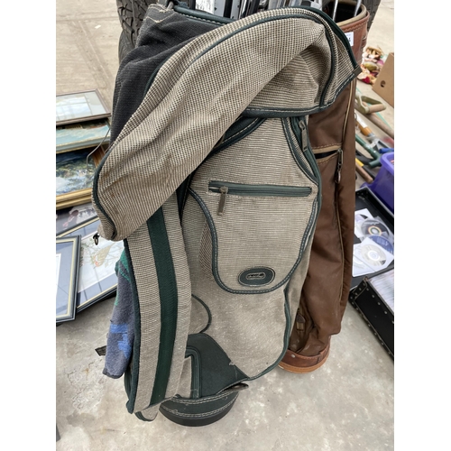 1874 - TWO GOLF BAGS WITH AN ASSORTMENT OF GOLF CLUBS TO INCLUDE CALLAWAY AND SPALDINGS ETC