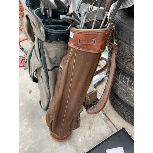 1874 - TWO GOLF BAGS WITH AN ASSORTMENT OF GOLF CLUBS TO INCLUDE CALLAWAY AND SPALDINGS ETC