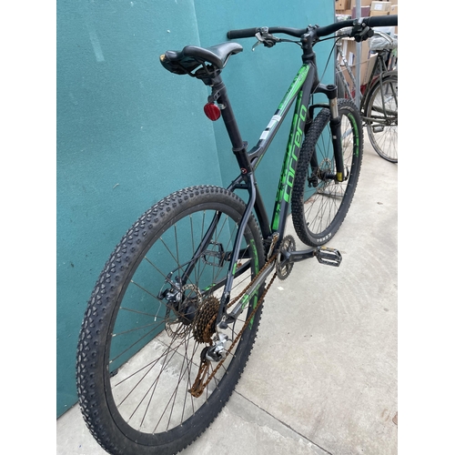 1903 - A CARRERA HELLCAT MOUNTAIN BIKE WITH FRONT SUSPENSION AND 24 SPEED GEAR SYSTEM