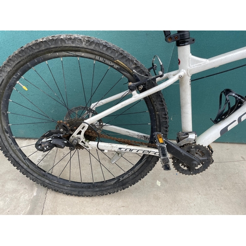 1905 - A CARRERA MOUNTAIN BIKE WITH FRONT SUSPENSION AND  18 SPEED GEAR SYSTEM