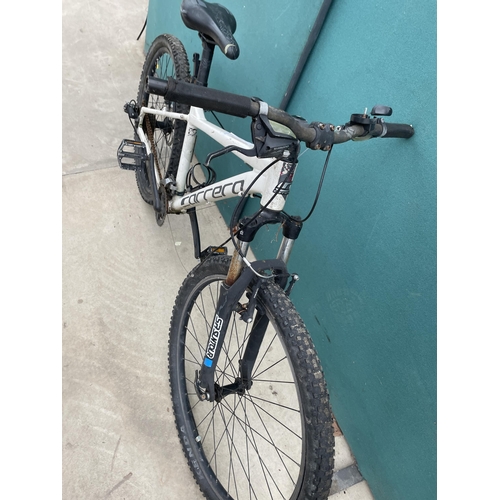 1905 - A CARRERA MOUNTAIN BIKE WITH FRONT SUSPENSION AND  18 SPEED GEAR SYSTEM