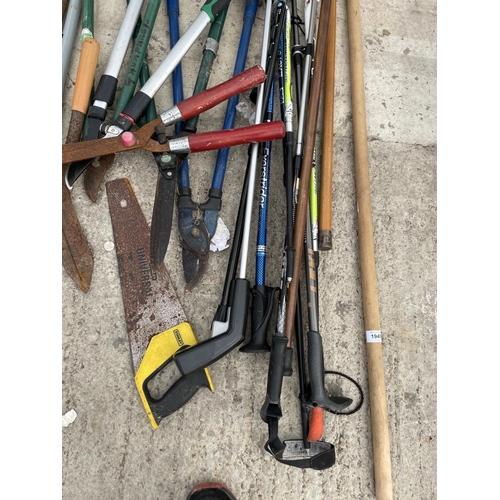 1945 - AN ASSORTMENT OF GARDEN TOOLS TO INCLUDE SHEARS, SAWS AND WALKING STICKS ETC