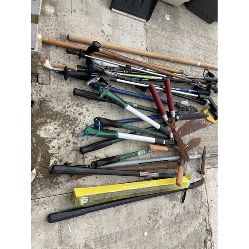 1945 - AN ASSORTMENT OF GARDEN TOOLS TO INCLUDE SHEARS, SAWS AND WALKING STICKS ETC