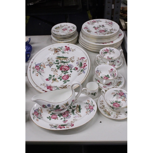 1049 - A QUANTITY OF VINTAGE WEDGWOOD 'CHARNWOOD' DINNER WARE TO INCLUDE VARIOUS SIZES OF PLATES, SERVING P... 