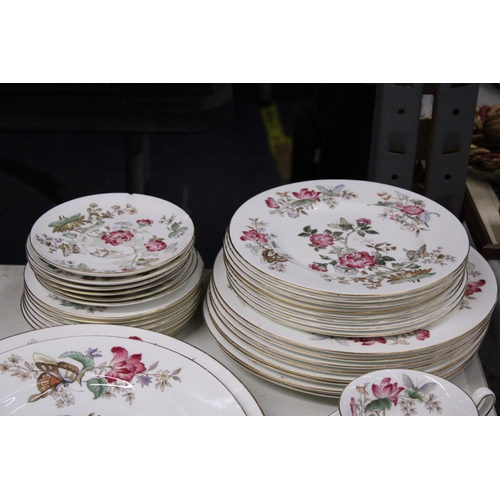 1049 - A QUANTITY OF VINTAGE WEDGWOOD 'CHARNWOOD' DINNER WARE TO INCLUDE VARIOUS SIZES OF PLATES, SERVING P... 