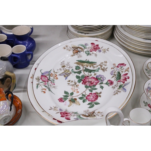 1049 - A QUANTITY OF VINTAGE WEDGWOOD 'CHARNWOOD' DINNER WARE TO INCLUDE VARIOUS SIZES OF PLATES, SERVING P... 