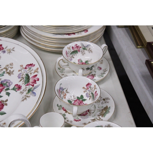 1049 - A QUANTITY OF VINTAGE WEDGWOOD 'CHARNWOOD' DINNER WARE TO INCLUDE VARIOUS SIZES OF PLATES, SERVING P... 