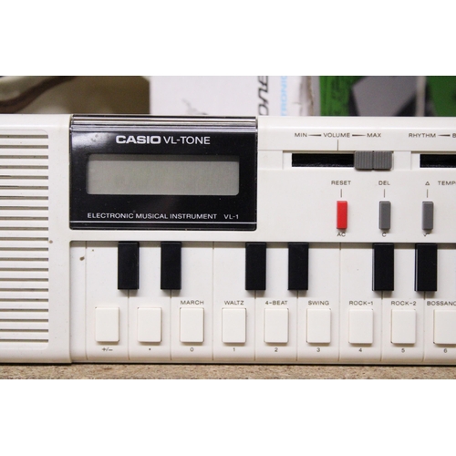 1165 - A BOXED STYLOPHONE AND A CASIO ELECTRONIC MUSICAL INSTRUMENT