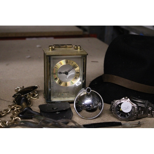 1166 - A MIXED LOT TO INCLUDE A CARRIAGE CLOCK, WATCHES, NUT CRACKERS, A TRILBY HAT, ETC