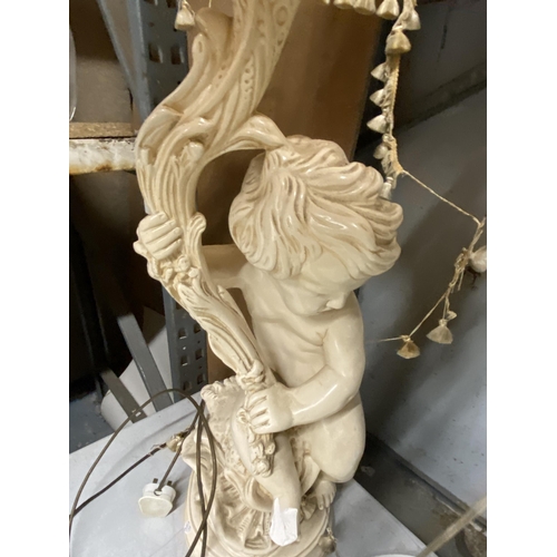 1220 - A LARGE CHERUB LAMP BASE WITH SILK LINED SHADE (A/F)