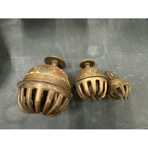 164 - A VINTAGE TRIO OF BRASS CLAW BELLS