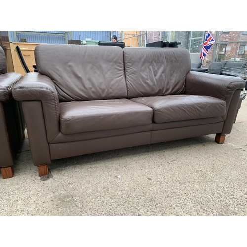 2989 - A BROWN LEATHER SETTEE, EASY CHAIR AND STOOL