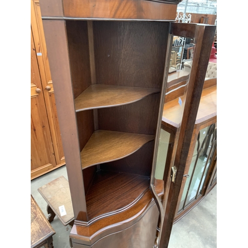 3030 - A MAHOGANY CORNER CUPBOARD