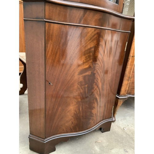 3030 - A MAHOGANY CORNER CUPBOARD