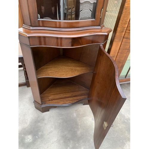 3030 - A MAHOGANY CORNER CUPBOARD