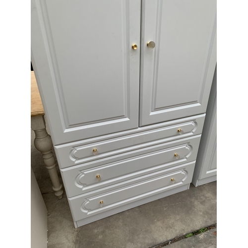 3031 - A WHITE TWO DOOR MIRROR WARDROBE, 34.5