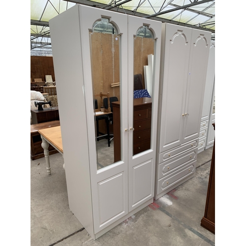 3032 - A WHITE TWO DOOR MIRROR WARDROBE, 34.5