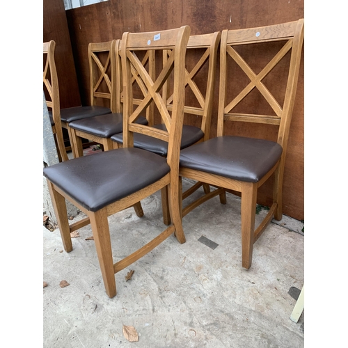 3042 - A SET OF SIX OAK DINING CHAIRS WITH X FRAME BACKS