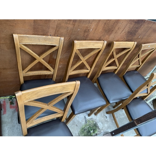 3042 - A SET OF SIX OAK DINING CHAIRS WITH X FRAME BACKS