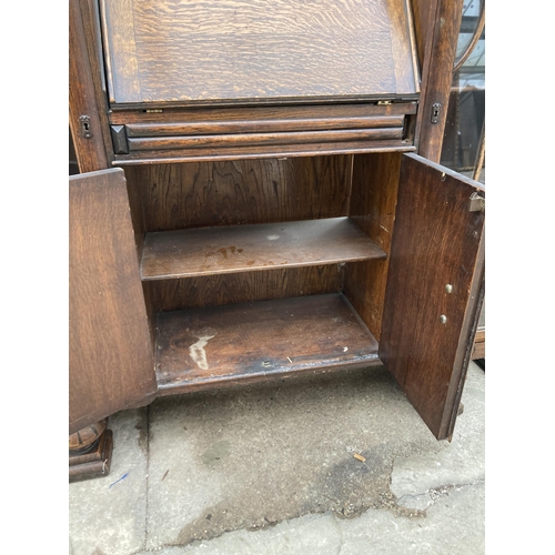 2993 - AN EARLY 20TH CENTURY OAK SIDE-BY-SIDE BUREAU