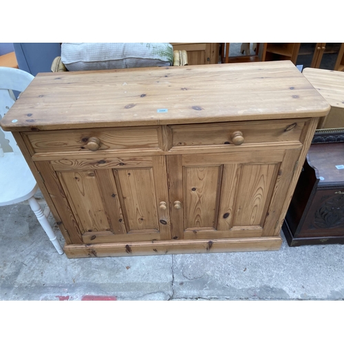 2998 - A PINE DRESSER BASE ENCLOSING TWO DRAWERS AND TWO CUPBOARDS, 48