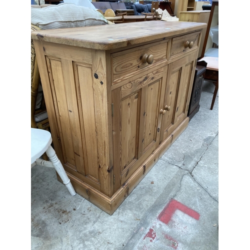 2998 - A PINE DRESSER BASE ENCLOSING TWO DRAWERS AND TWO CUPBOARDS, 48