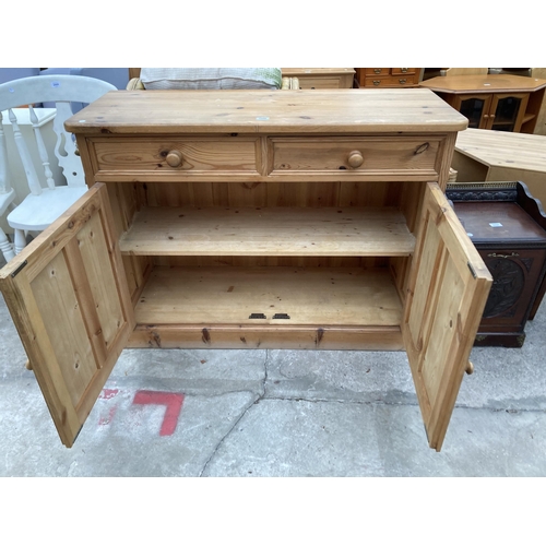 2998 - A PINE DRESSER BASE ENCLOSING TWO DRAWERS AND TWO CUPBOARDS, 48