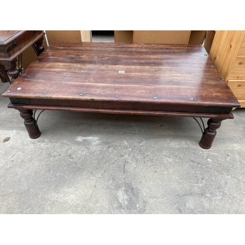 3002 - A HARDWOOD STUDDED COFFEE TABLE, 53