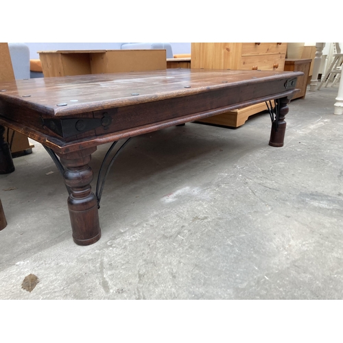 3002 - A HARDWOOD STUDDED COFFEE TABLE, 53