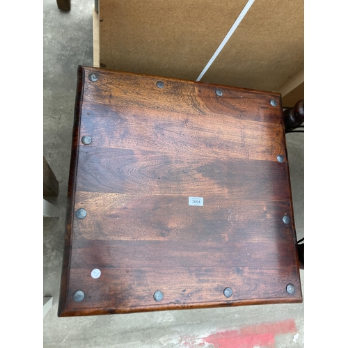 3004 - A HARDWOOD STUDDED LAMP TABLE, 24