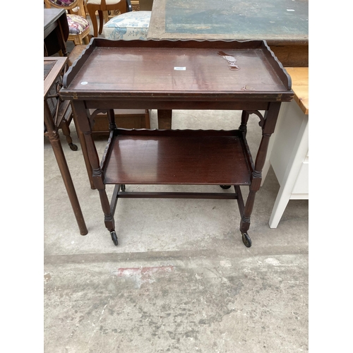 3006 - A MID 20TH CENTURY MAHOGANY TWO TIER TROLLEY WITH FOLD OVER GAMES TOP