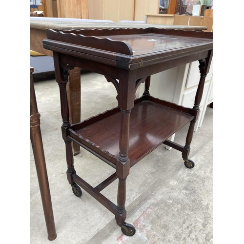 3006 - A MID 20TH CENTURY MAHOGANY TWO TIER TROLLEY WITH FOLD OVER GAMES TOP