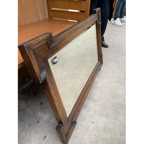 3056 - AN EARLY 20TH CENTURY OAK FRAMED BEVEL EDGE WALL MIRROR, 37.5