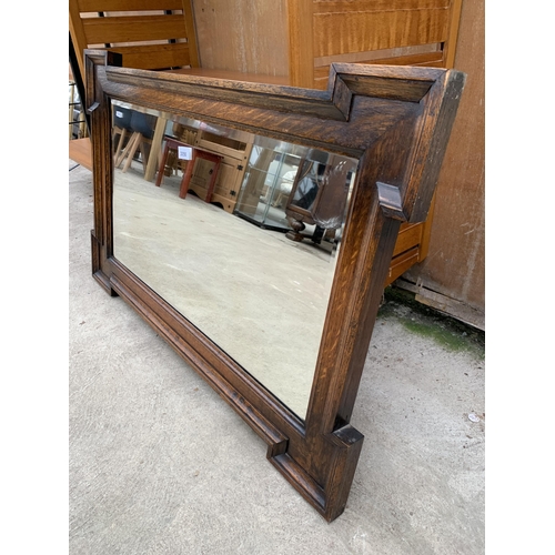 3056 - AN EARLY 20TH CENTURY OAK FRAMED BEVEL EDGE WALL MIRROR, 37.5