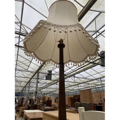 2695A - A MID 20TH CENTURY STANDARD LAMP WITH SHADE