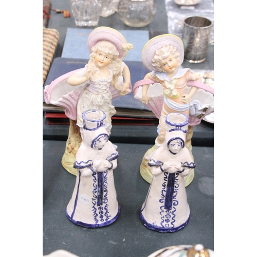 163 - A PAIR OF DELFT STYLE CANDLESTICKS PLUS TWO CONTINENTAL STYLE LADY FIGURES