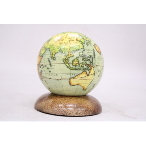 227 - A SMALL WORLD GLOBE ON A WOODEN BASE, HEIGHT 12CM