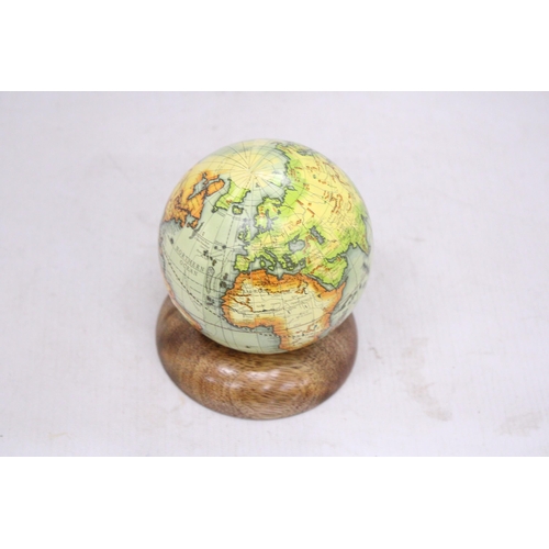 227 - A SMALL WORLD GLOBE ON A WOODEN BASE, HEIGHT 12CM