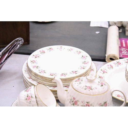 300 - A MINTON SPRING BOUQUET PART DINNER SERVICE TO INCLUDE A TEAPOT, LIDDED SUGAR BOWL, MILK JUG, SAUCE ... 