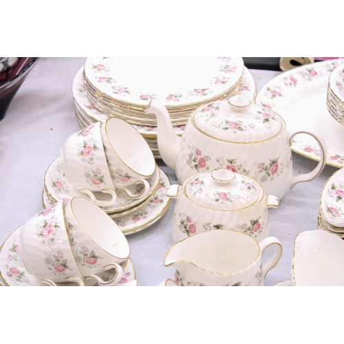 300 - A MINTON SPRING BOUQUET PART DINNER SERVICE TO INCLUDE A TEAPOT, LIDDED SUGAR BOWL, MILK JUG, SAUCE ... 