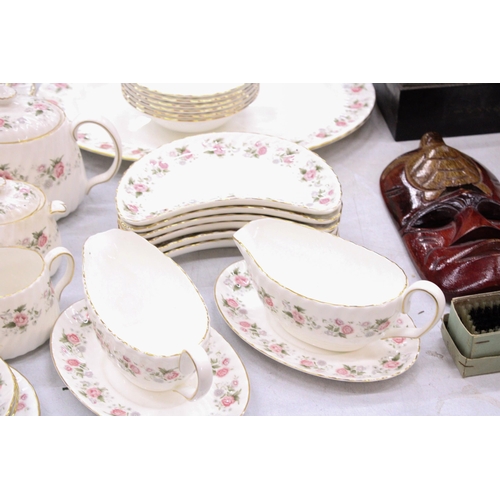 300 - A MINTON SPRING BOUQUET PART DINNER SERVICE TO INCLUDE A TEAPOT, LIDDED SUGAR BOWL, MILK JUG, SAUCE ... 