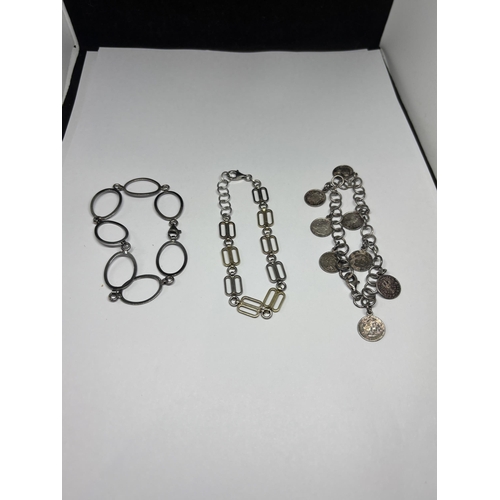 601 - THREE SILVER BRACELETS