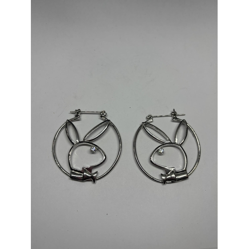 623 - A PAIR OF SILVER PLAYBOY EARRINGS