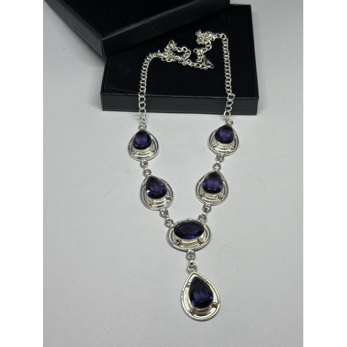 631 - A MARKED 925 SILVER NECKLACE WITH PURPLE STONES IN A PRESENTATION BOX