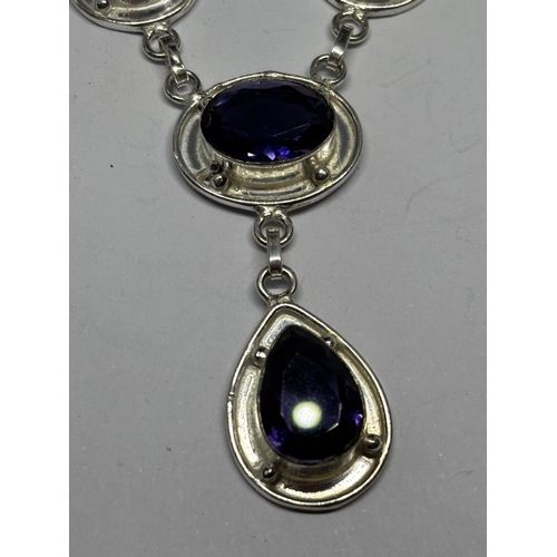 631 - A MARKED 925 SILVER NECKLACE WITH PURPLE STONES IN A PRESENTATION BOX